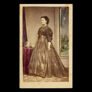 Tinted studio portrait of a young woman. Melbourne, late 1860s.