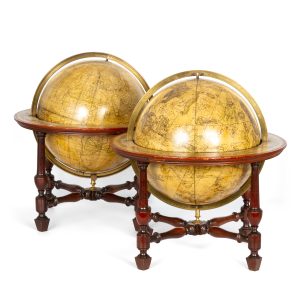 A matching pair of Georgian terrestrial and celestial table globes