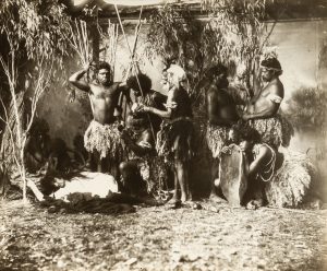 A pair of tableau photographs forming part of a narrative sequence, showing white women being aided by Aborigines. Northern Victoria or Southern New South Wales, 1896-98.