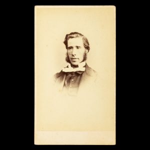 Studio portrait of a gentleman wearing a white bow-tie. Hobart Town, Tasmania, early 1860s.