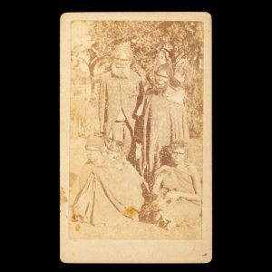 Portrait of a group of Menang Noongar men and women. Albany area, Western Australia, late 1880s.