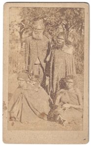 Portrait of a group of Menang Noongar men and women. Albany area, Western Australia, late 1880s.