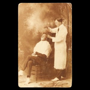 Barbershop tableau. Queenstown, Tasmania, c.1910.