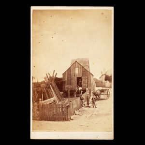 "Building Allotments" timber yard with supervisor and workers. Sydney, c.1870.