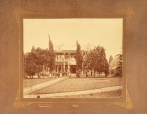 A Melbourne family posed outside their mansion (possibly on St. Kilda Road), c.1895.