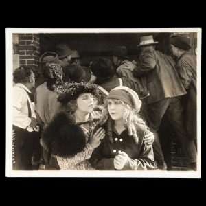 Sydney-born Australian silent film actress Louise Lovely in two scenes from "Painted Lips" (1918).
