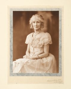 Studio portraits of Lily Kerr-Pearse, wife of the private secretary to the Governor of Western Australia, in fancy dress for the Centenary Ball. Perth, 1929.